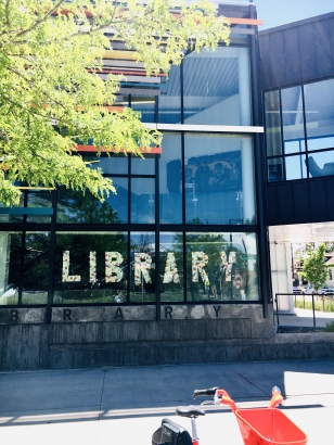 Mexican Heroes mural viewed from outside Rodolfo “Corky” Gonzales Branch Library