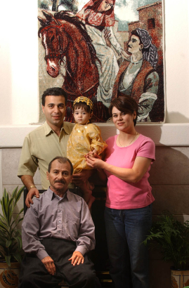 Thorton, Colo., photo taken January 27, 2004- Handrin Ismail (top left) with his daughter Valla Ismail (top center) wife, Bayan Ismail, and father Salah Ismail (bottom in chair). All are from Erbil, Kurdistan in northern Iraq