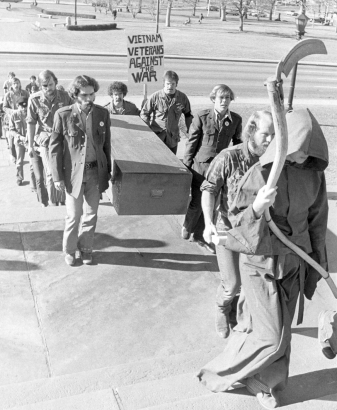 Vietnam Veterans Against the War at the steps of the west entrance of the Colorado Statehouse hold a memorial service all killed in the Southeast Asian war. December 31, 1971. Photo by Dick Davis. Rocky Mountain News Photo Collection, Box 461