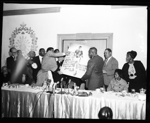 Boxer Joe Lewis (third from right)