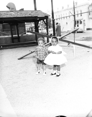 Toddlers on the Playground on Mother's Day
