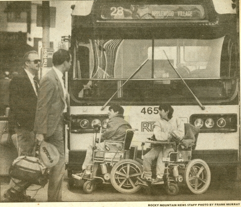 ADAPT members block a bus with their wheelchairs to demonstrate RTD's inaccessible buses on February 15, 1985. From the Wade and Molly Blank Papers (WH2283), Box: 10, Folder 7.