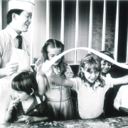 Mark Chang of Yen King restaurant teaches students to make noodles for Chinese Festival Day. 1985