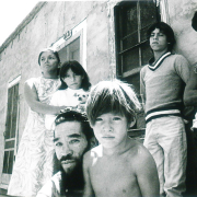 Espinoza Family in front of adobe dwelling in Greeley's "Spanish colony" 1971