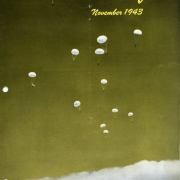 U. S. Army paratroopers over Denver's Municipal Airport in an Independence Day demonstration.