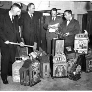 Gambling Bust: L to R Roger Smith,security and custodian police department; Captain John O'Donnell; John H. Winchell, clerk, District Court; Dave Rosner, Deputy District Attorney. [gambling]