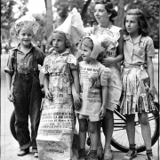 Paper costumes at City Park playground. Joe Burke, Burton Burke, May F. Burke, Zelda Kapland, Norma Stockham. August 1, 1943 [City Park]