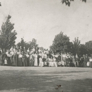 Outdoor group portrait of the family of Casimiro Barela, Colorado State Senator at El Moro (Las Animas County), his home near Trinidad, Colorado. Shows well dressed men, women and children. Senator Barela, his wife Damiana and daughters are center, front row.