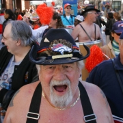 Broncos "Barrel Man" Tim McKernan, cq,  leads over one hundred fans up and down the 16th Street Mall during a Kool 105 Parade to support the Denver Broncos in their game against the New England Patriots Saturday which will be the first play off game at...