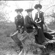 Outdoor portrait of women in Denver, Colorado; costume includes applique, jackets, and hats with veils.