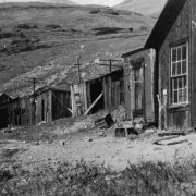View of Waldorf, Clear Creek County, Colorado; shows buildings including (l to r): power house, stable, Post Office, and cables of the bucket line from Santiago to Waldorf.