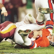(DENVER, COLO., JANUARY 31, 1987) Denver Broncos quarterback John Elway is sacked by a Whashington Redskins defender during the Super Bowl IN San Diego, Cali., on January 31, 1987. (ROCKY MOUNTAIN NEWS FILE PHOTO BY KEN PAPALEO)