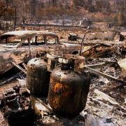 Propane tanks and a car destroyed by Colorado's Coal Seam Fire in 2002.