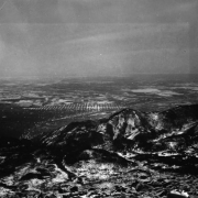 View east from Pikes Peak on a moonlight night, shows the lights of Colorado Springs, El Paso County, Colorado and snowcovered foothills. Image taken by AdAmAn Club member Harry Standley, during the annual mountaineering trek to the top of the 14,110 foot mountain to set off fireworks on New Years Eve.
