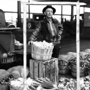 The oldest figures at Denver public markets in point of years of attendance is John A. Boyd, shown here, who has been trading at the markets fifty years. 