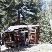 View of the Bootlegger's Cabin located at 3873 Colorado Road 46, Golden Gate Canyon State Park, Gilpin County, Colorado. This single story log cabin lies at the foot of Tremont Mountain and is an example of the hundreds of stills producing moonshine during Prohibition.  The structure was added to the State Register in 1995.