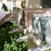 A mail carrier delivers mail to the cottage houses in the Poplar community in Boulder, Colorado on October 9, 2007, with 14 homes that surround a common grass area.  From their web site: "The project was initiated by a non-profit development group, the...