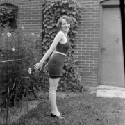 A woman poses in a swimming suit, Denver, Colorado.