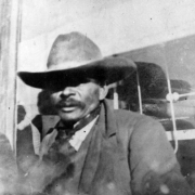 Benjamin J. Hodges, a Mexican Black man, poses in an outfit including cowboy hat and moustache.
