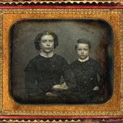 Studio portrait (sitting) of Elizabeth Minerva Byers (Sumner) and Frank S. Byers, her son.