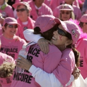 (Denver, Colo., October 3, 2004) Sandi Ogin, of Denver, left, hugs Annette Ramer, of Denver, right, at the 2004 Komen Race for the Cure in Denver, Colo., on Sunday, October, 3, 2004. Both are 24 year survivors of breast cancer. Approximately 60,000 peo...