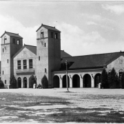 A view of the two story Spanish style pavilion designed by John J. Humphreys and William E. Fisher in City Park in Denver, Colorado. The building was erected on the west side of City Park Lake (Ferril Lake) in 1896.
