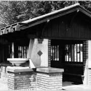 Shows a gazebo style shelter in City Park in Denver, Colorado.