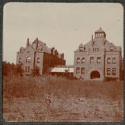 View of St. Luke's Hospital on the corner of 19th (Nineteenth) Avenue and Pearl Street in Denver, Colorado. The two buildings are connected by a rooftop patio.