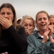 Tears turn briefly to joy as teens watch classmates flee to safety.