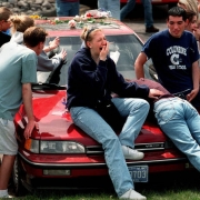 Wracked with sorrow, Columbine students in Clement Park grieve at the car of Rachel Scott.
