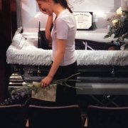 A mourner moves slowly past the casket of Isaiah Shoels at the Heritage Christian Center.