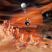 This artist's conception shows Titan's surface with Saturn appearing dimly in the background through Titan's thick atmosphere of mostly nitrogen and methane. The Cassini spacecraft flies overhead with its high-gain antenna pointed at the Huygens probe ...