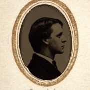 Head and shoulders profile studio portrait of a man identified as Cliff.