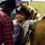 (Denver, Colo., 1/19/05- David Motes (right) talks with his partner Zane David Bruce their competition in the team roping event at the Wednesday Matinee Rodeo,  January 19, 2005 at the National Western Stock Show and Rodeo. At 51, Motes is the oldest c...