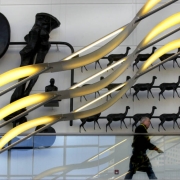 (DENVER , Colo., December 6, 2004)  A pedestrian makes his way up the staircase of Lobby A on the 14th Street side of the  new Denver Convention Center Expansion which  opened for business Monday as Denver Mayor John Hickenlooper cut the ribbon to offi...