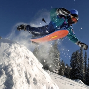 (11/30/2004) David Parks, 12, on vacation from Oklahoma, flies over a snow ramp while sledding the top of Berthoud Pass on Monday, November 30, 2004. The state just released its latest figures on this year's snow pack percentages. Photo by TODD HEISLER...