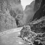 View of a Denver & Rio Grande Western Railroad passenger train at Hanging Bridge, Royal Gorge of the Arkansas River, Fremont County, Colorado.