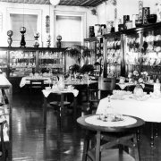 Interior view of the Daniels and Fisher store in Denver, Colorado; shows displays of China, cut crystal, end tables, porcelain lamps.