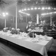 Interior view of the Daniels and Fisher store in Denver, Colorado; shows displays of dinnerware, silver, crystal, flowers, and lamps.