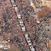 A caravan of fire trucks carry the Denver Broncos south down Broadway to Civic Center Park.  A crowd of 375,000 waited to greet the Super Champions for a parade and rally after they returned from winning Super Bowl XXXIII in Miami.