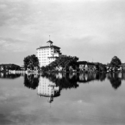 View of the Broadmoor Hotel and Lake in Colorado Springs, El Paso County, Colorado; the Italianate resort is reflected in the water.