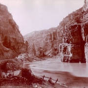 View of Glenwood Canyon and the Colorado River with the "Glenwood Extension" of the Denver & Rio Grande Railroad line in Garfield County, Colorado. Shows telegraph poles.