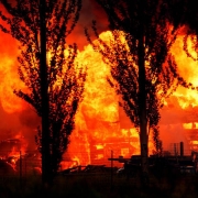 A barn bursts into flames after it is caught in the Valley Fire.