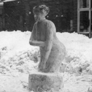 View of a nude woman sculpted from snow during the snowstorm of 1913 in Denver, Colorado.