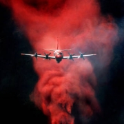 A P3 Orion bomber drops a load of fire retardant on the Big Elk Fire near Estes Park, Colorado.
