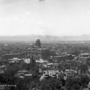 A northwestward, bird's-eye view of downtown Denver, Colorado; County Courthouse is the predominant structure at left-center of image (built 1883 at 16th & Tremont); Brown Palace Hotel at far right (opened 1892 at 17th & Broadway).