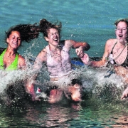 Members of the Niwot 16A girls softball team  react to jumping into the cold water Sunday morning January 1, 2006, at the Boulder Reservoir.  They are from left to right Katie Ratliff, Isabelle Mastronardi, Kelsey Kreager, Abby Ratliff and Ashley Primm...
