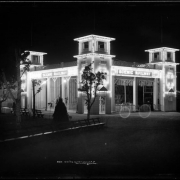 Scenic Railway building at night, at "White City" (later called Lakeside Amusement Park), Lakeside, Colorado near Denver; summer evening, night time view of illuminated buildings.
