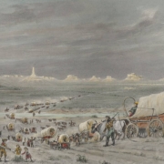 A wagon train moves towards the North Platte River and Chimney Rock, on the Oregon Trail, in Morrill County, Nebraska. Shows Conestoga wagons pulled by oxen, a herd of horses, men on horseback, and women and children. A boy holds a rifle and a dead rabbit and two young girls pick wildflowers. Rock formations are in the distance.