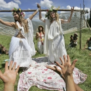 Sunny and Sun (left to right cq) are announced as wife and wife in a pagan style wedding ceremony on Tuesday morning July 4, 2006 at the 34th annual national gathering of the Rainbow Family of Living Light. The ceremony came after a morning of silence ...